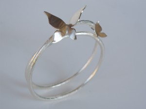 Alae Argentum, butterflybangle